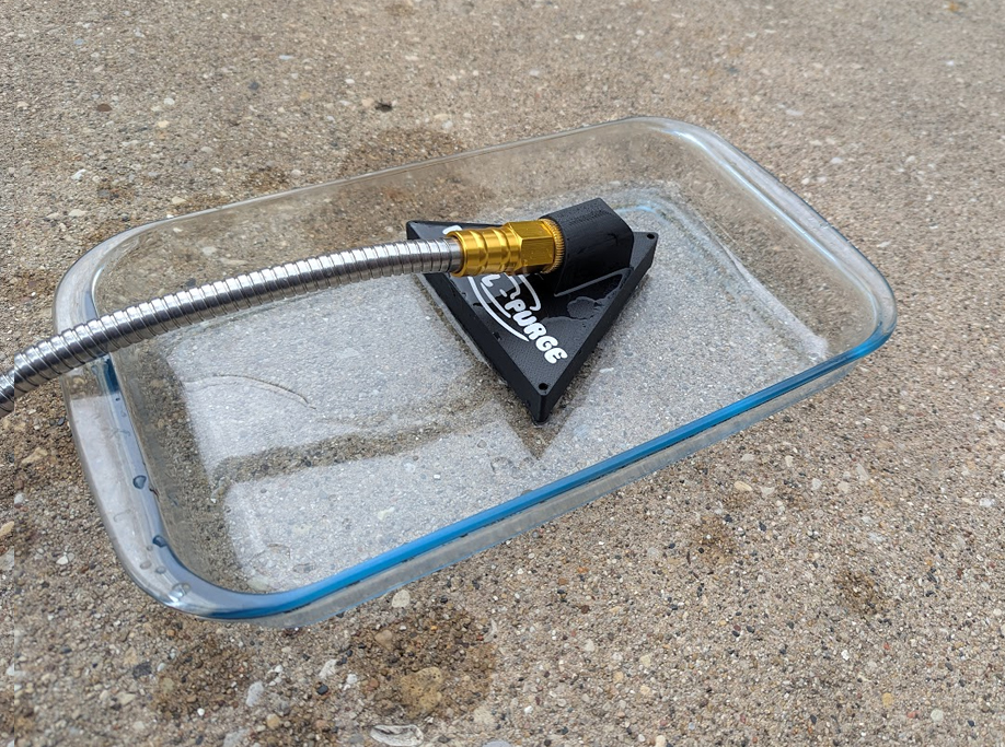 After using PUD-L-PURGE: surface is nearly dry, water removed down to 3/16 inch